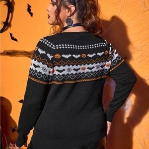 NWT black Halloween sweater stretchy material love it too big on me